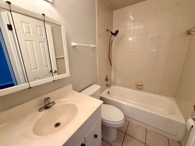 Building Photo - Light-Filled 2BR Condo in Gated Pelican Bay Near Golf, Beach & I-95