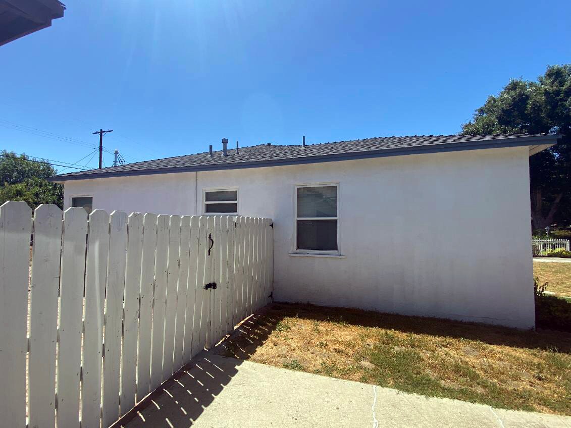 Side of property - 8920 Darby Ave