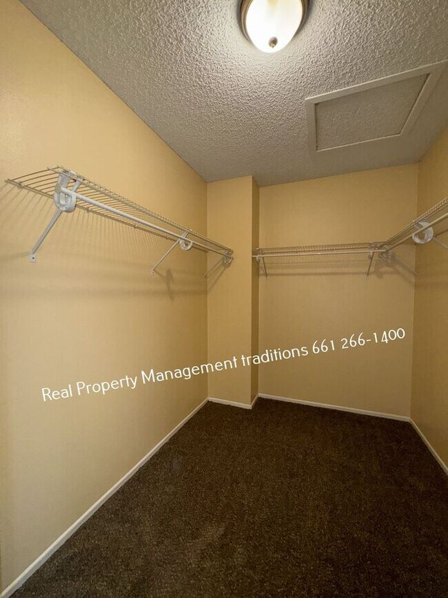 Building Photo - ***FIRST MONTH FREE*** 2 plus 2 condo in l...