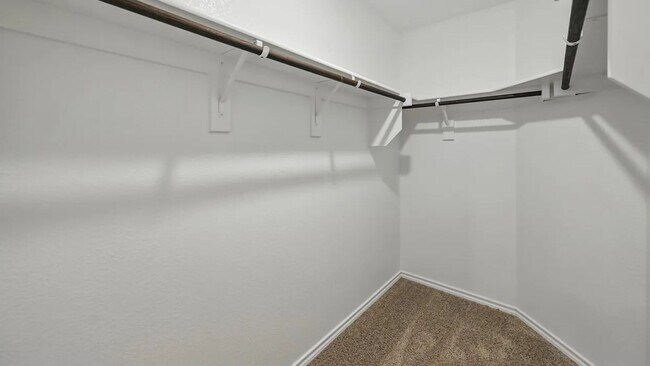 Building Photo - Beautiful new 4-bedroom, 2-bath home with an open floor plan, granite kitchen, two-car garage, an...