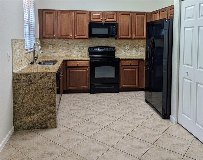 Building Photo - 10785 Paperbark Pl