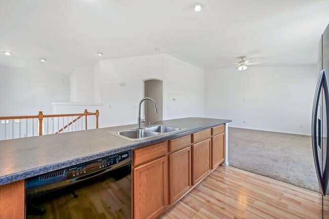 Building Photo - Bright & Spacious 4BR Tri-Level Home w/ Backyard + 2-Car Garage | Pool Access Included!