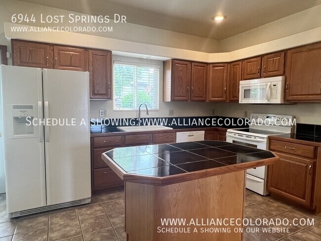 Building Photo - 6944 Lost Springs Dr