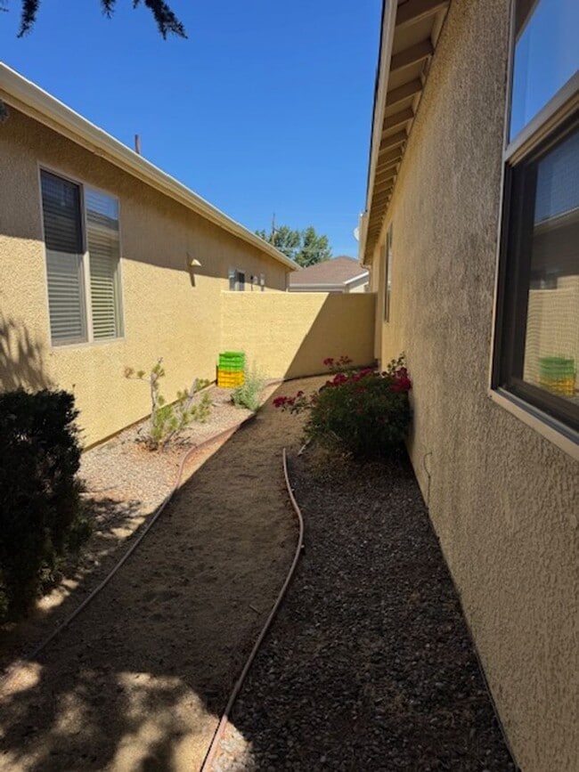 Building Photo - Located in a Quiet, Gated Community in Car...