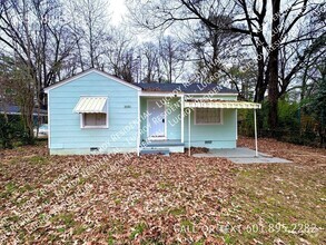 Building Photo - Welcome to this cozy 2 bedroom, 1 bathroom...