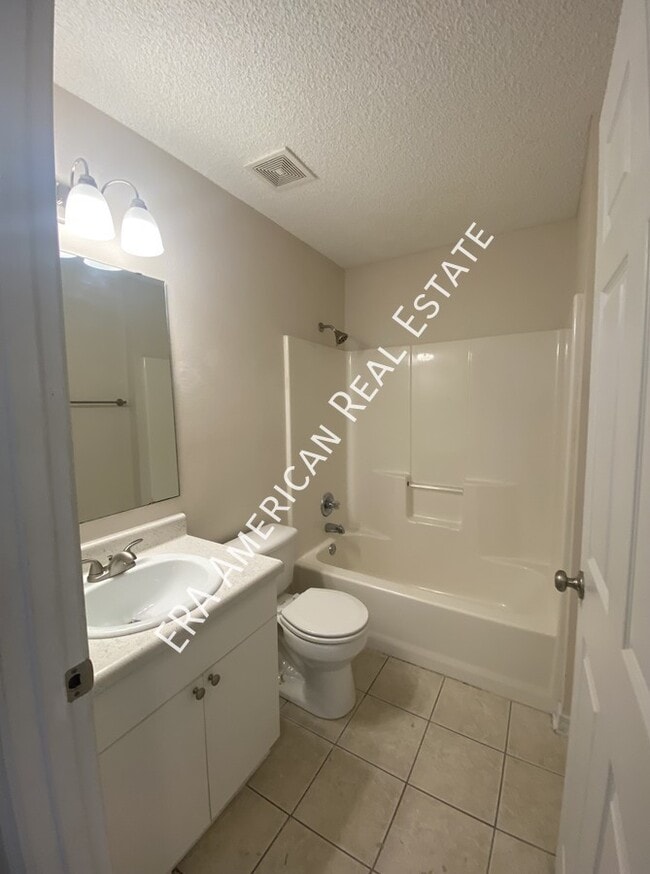 Building Photo - 7418 Woodmont Rd