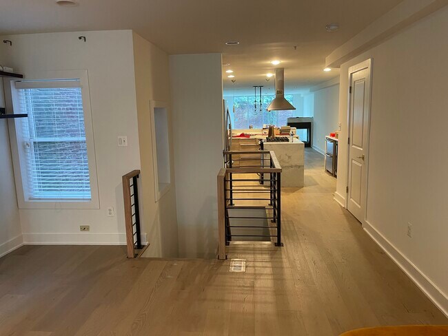 Stairs and view into kitchen - 505 O St NW