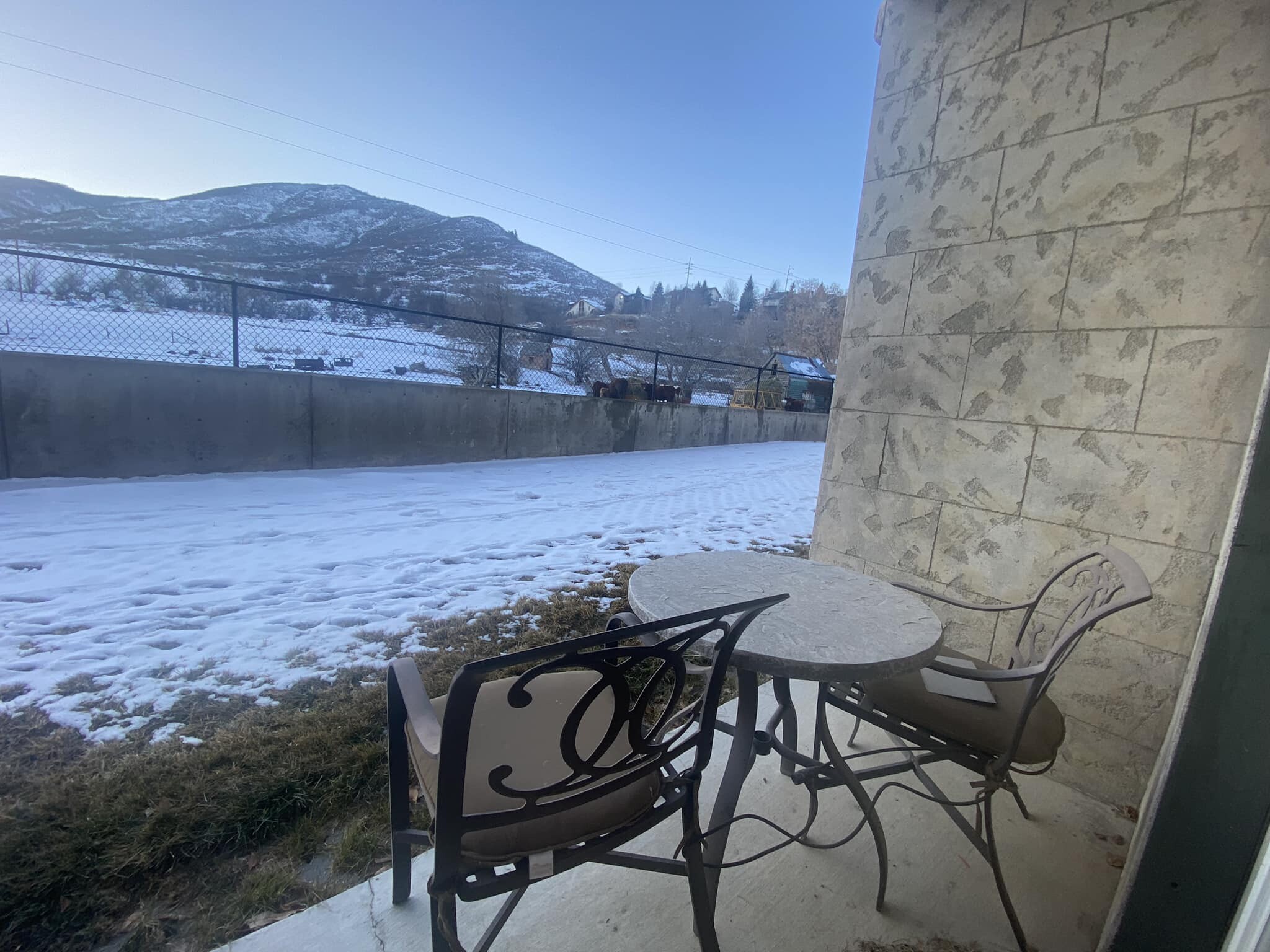 Back cubby opens off the master bedroom to views of the mountains and adjacent pasture. - 840 Bigler Ln