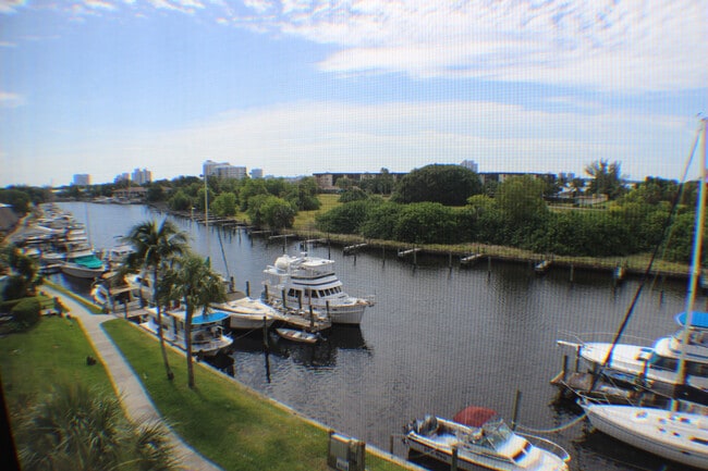 Building Photo - 2/2 Condo with Marina and River Views-Includes cable and water