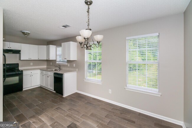 Building Photo - 7550 Sugarcreek Dr