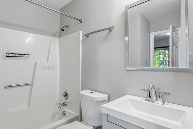 Building Photo - NW - Updated Home with Granite Counter-tops, Fire Place, Deck, Storage Building, Garage!