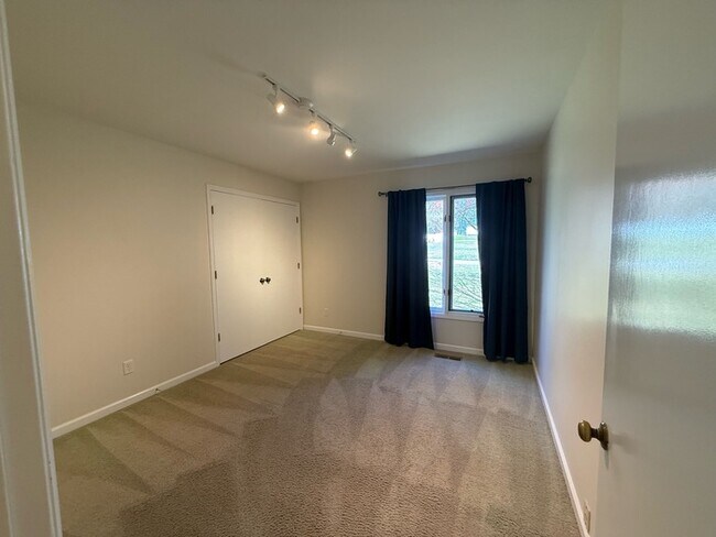 Building Photo - Spacious ranch, fenced yard, 2 car garage, large basement, near Wake Tech