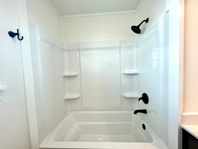 Building Photo - Well appointed 2 bed, 2.5 bath Townhouse Partial Utilities Included!