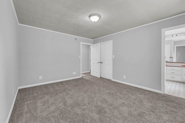 Building Photo - spacious 4-bedroom, 2.5-bath home featuring a 2-car garage and fresh updates throughout.