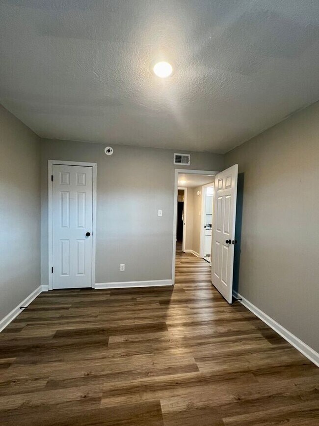 Building Photo - Your Spring Upgrade Starts at The Den