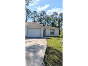 Building Photo - Duplex-1/2 OFF 1st Full Month's Rent