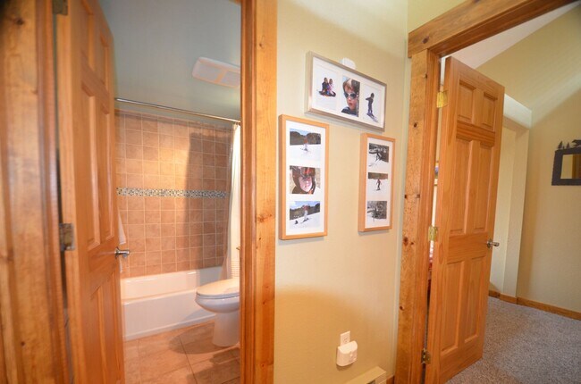 Building Photo - Pets Negotiable!  Walk to town, community hot tub! 2 month lease!