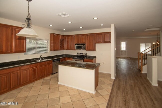 Building Photo - 605 N 111th Dr