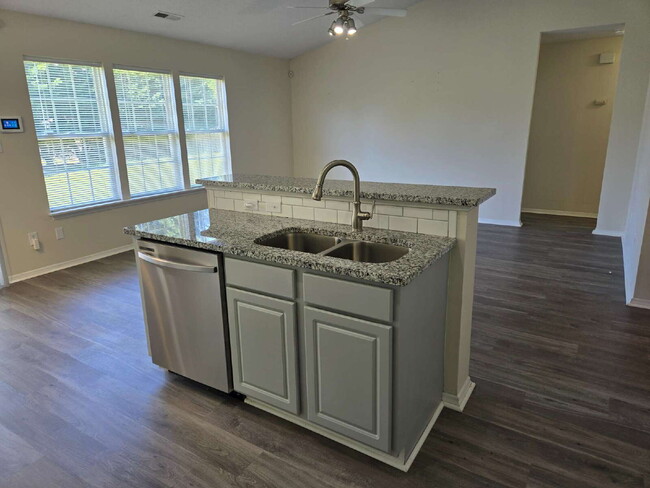 Building Photo - A home that exudes Warmth and Style