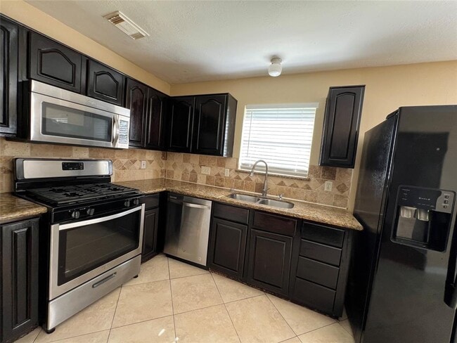 Building Photo - 8411 Tamayo Dr