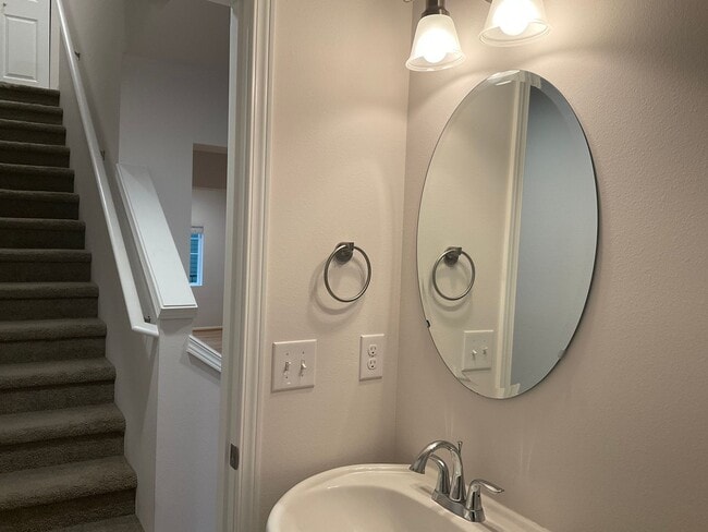 Building Photo - Riverfront Townhome with Tandem Garage & Fenced Yard