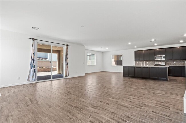 Building Photo - Spacious 5-bedroom home in gated community
