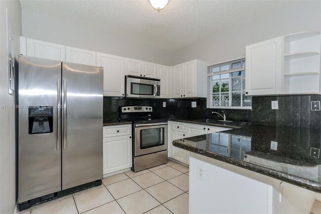 Building Photo - 12284 SW 148th Terrace