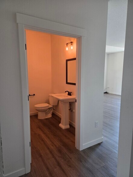 downstairs 1/2 bath - 5450 NW Stardown Dr
