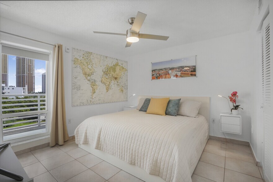 Guest bedroom. King bed. - 17801 N Bay Rd