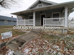 Building Photo - Attractive 2 BR 1 BA House with 2-Car Garage and Covered Porch (NO SECTION 8)