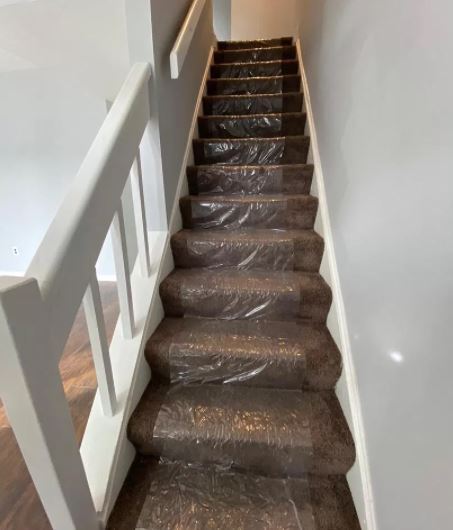 Stairs to second level - 11 Sailboat Cir