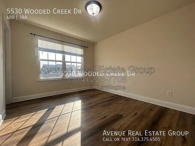 Building Photo - 5530 Wooded Creek Dr