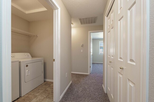 Building Photo - Your Next Home Awaits! 4BR/2.5BA with Fenc...