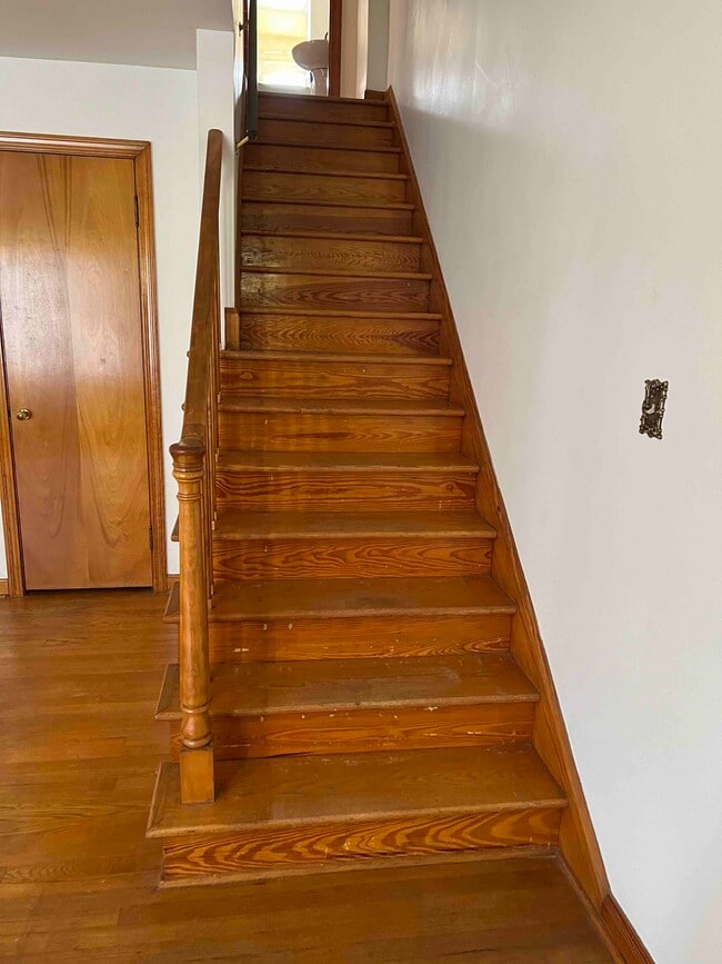 stairs to upstairs bedroom and bath - 705 Broadway Blvd