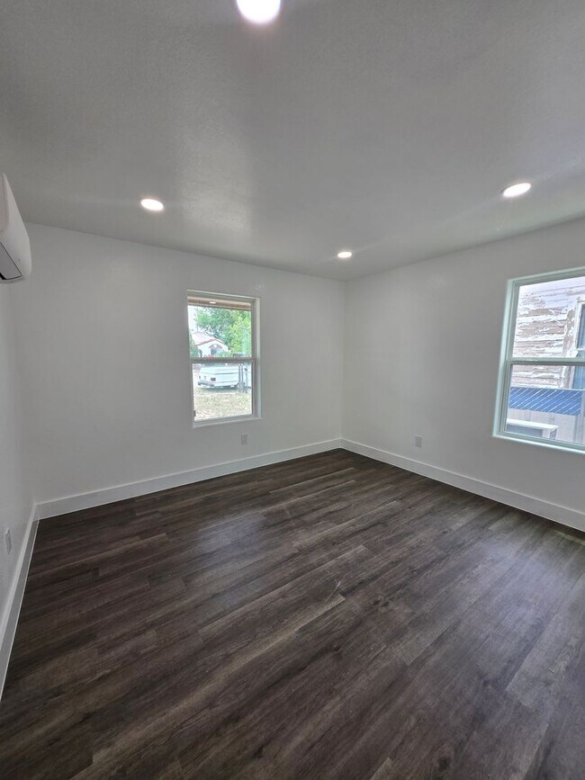 Building Photo - New paint and flooring throughout.