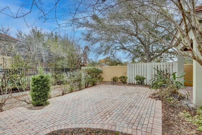 Building Photo - AGENT SHOWINGS ONLY! Stunning 3/2.5 Corner Unit Townhome with a Spacious 2 Car Garage in the Gate...