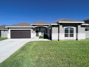 Building Photo - Gorgeous 'Tres Lagos' 4 bed/3 bath home, now available in McAllen, TX