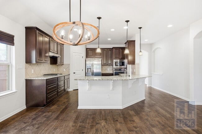 Building Photo - 8336 Paola St