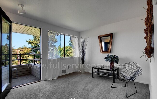 Building Photo - View Townhome Overlooking Genesee Park, Private Patio, Decks & Garage Parking