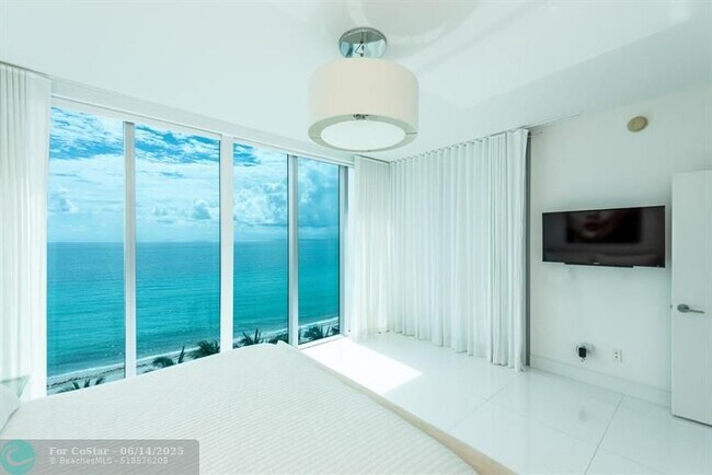 Building Photo - 6899 Collins Ave