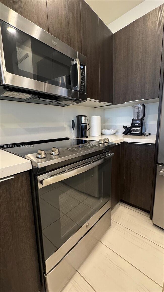 Building Photo - 6416 NW 102nd Ct