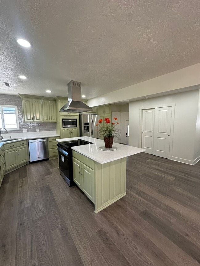 Building Photo - Save Over $4,000 – Enjoy 6 Weeks FREE Rent...