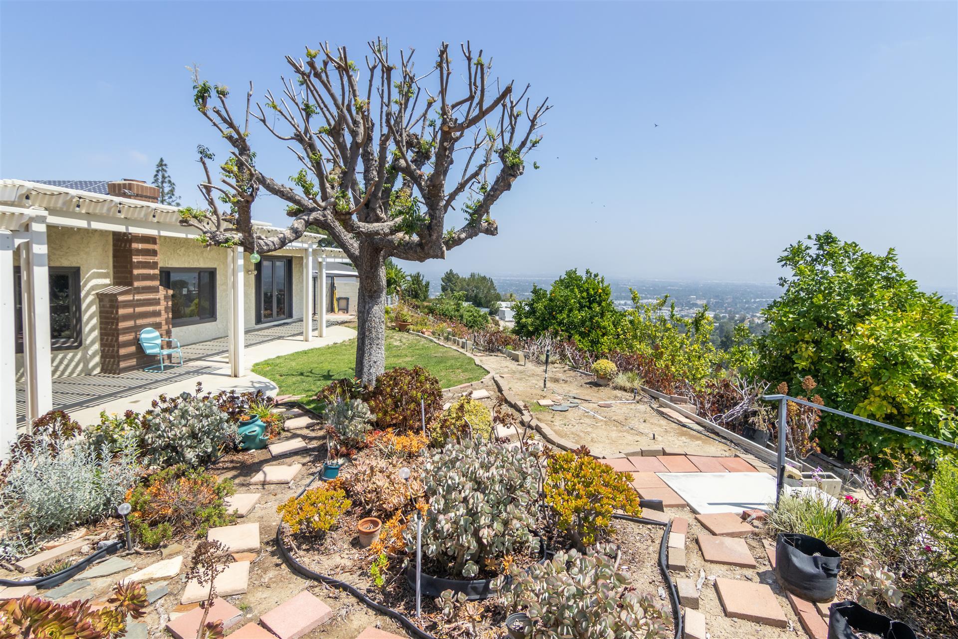 Back yard with beautiful views - 14676 Deervale Pl