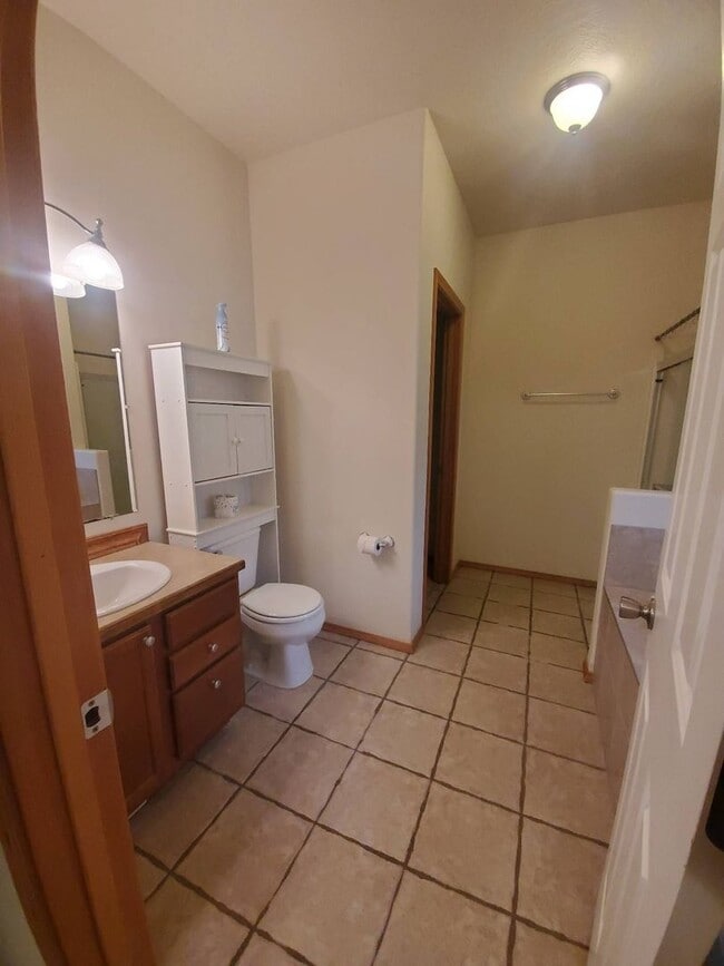 Building Photo - Triple Car Garage & New Interior Paint