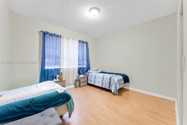 Building Photo - 5840 W Sample Rd