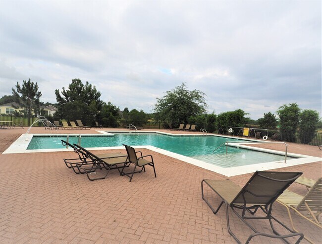 Building Photo - 4 Bedroom home with community pool!