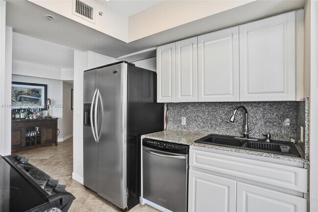 Building Photo - 6301 Collins Ave