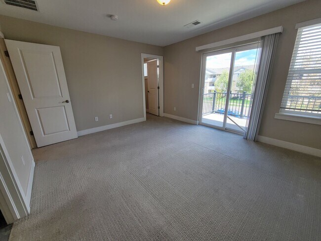 Building Photo - Spacious 3 level, 4 bedroom townhome with attached 2 car garage at Silver Meadows Townhomes on Lo...
