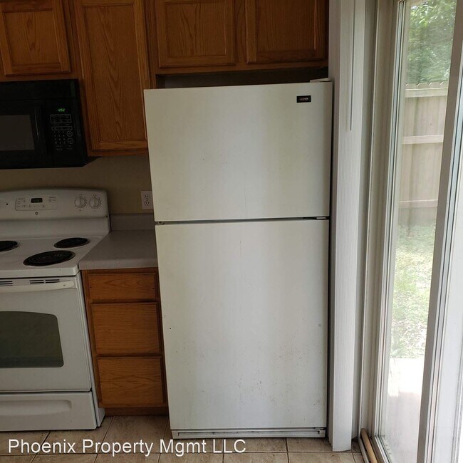 Building Photo - 3409-3411 Squirrel Dr