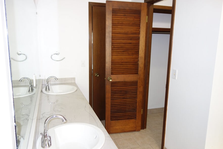 Master bath 2nd walk-in closet on right - 3324 E 73rd St